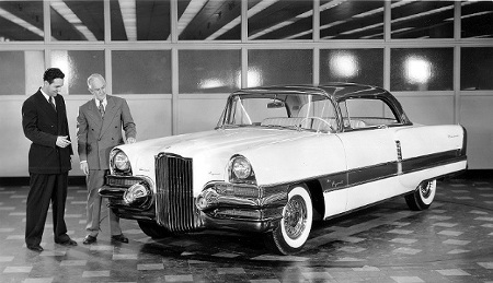 Packard designer Richard Teague looking at the “Request” show car