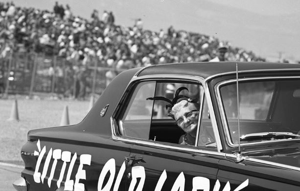 Kathryn Minner sitting inside 1960s Dodge Dart 1