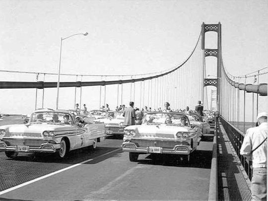 1958 Oldsmobile convertibles crossing during Opening Day on the Mackinac Bridge General Motors Hemmings 4