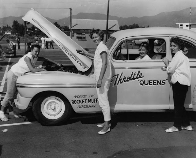 Women auto mechanic working on Ford drag racer 1956 4