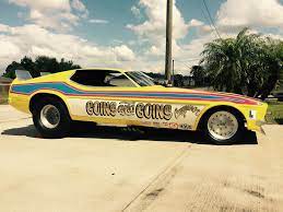 Side view of Nellie Goins Mustang funny car NHRA 4