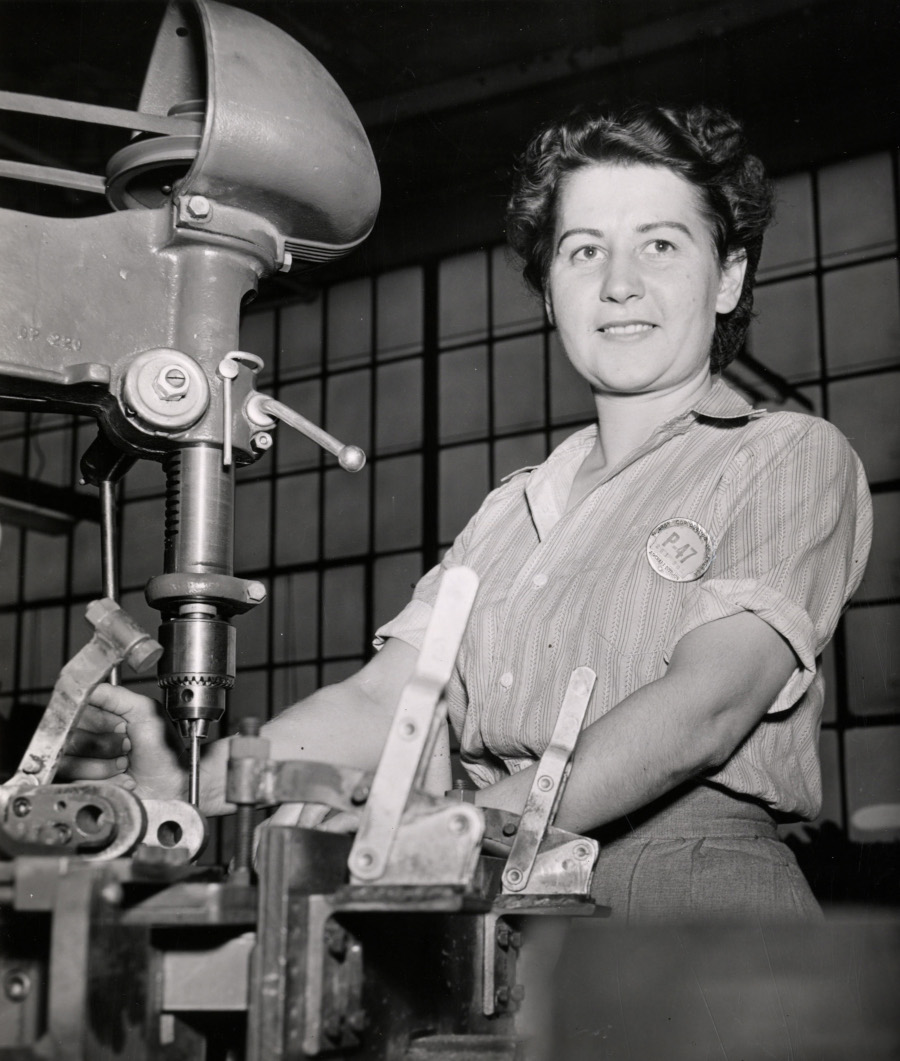 A woman works on operating machinery in the assembly of the P 47 Thunderbolt Detroit Public Library Digital Collection RESIZED 6