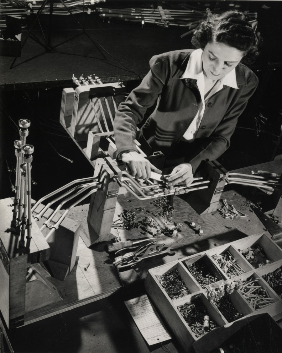 Woman during wartime working as an assembler at Ford NAHC RESIZED 2