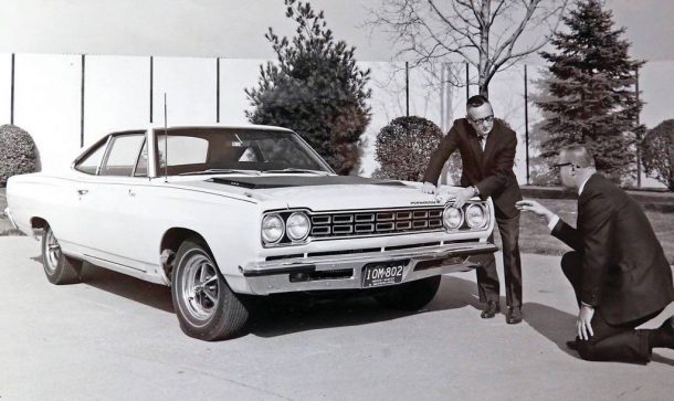 The front end of the Plymouth Road Runner with Chrysler EVP Dick MacAdam Stellantis NA Archives 2